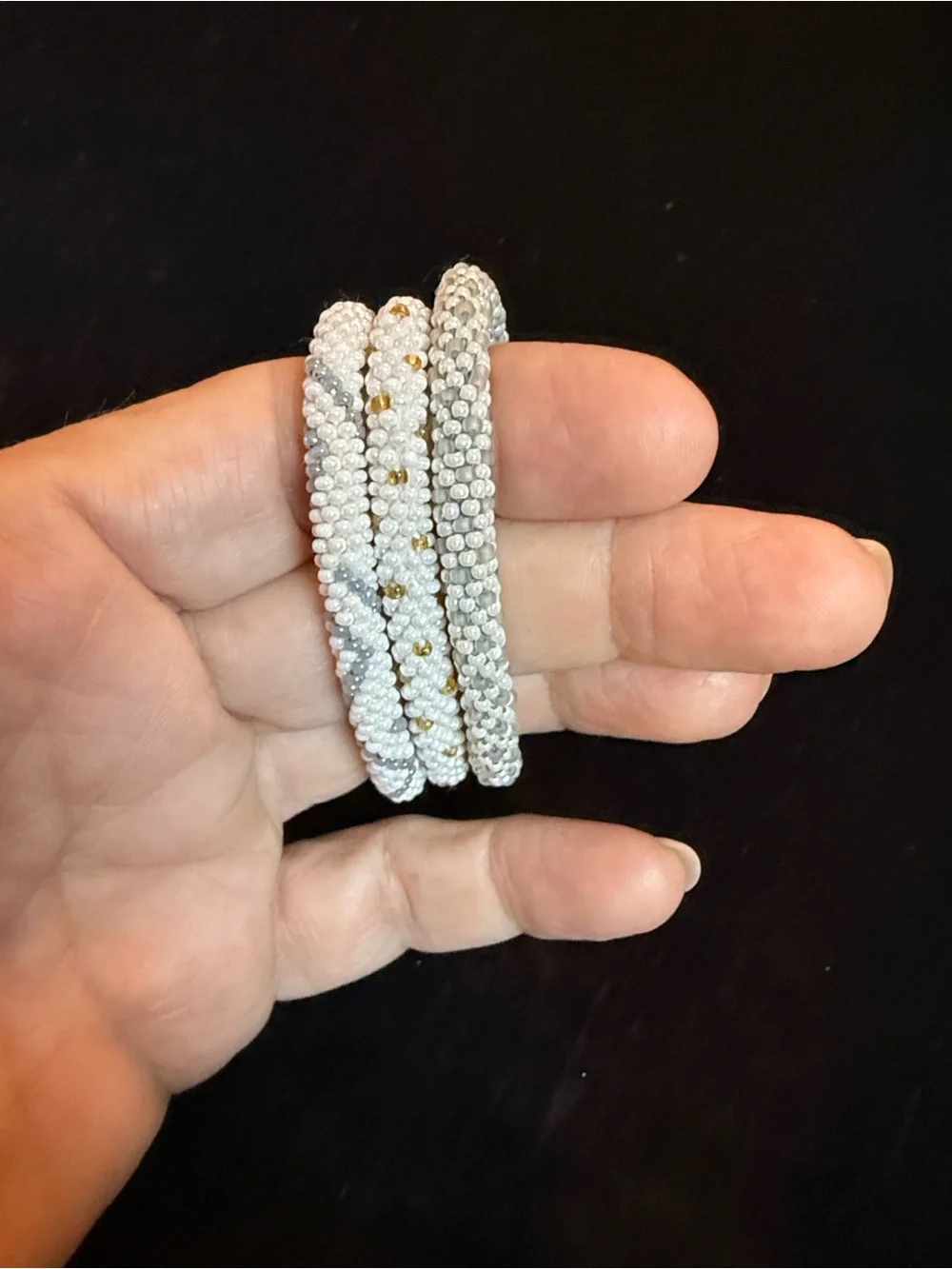 Aid through Trade bracelets making